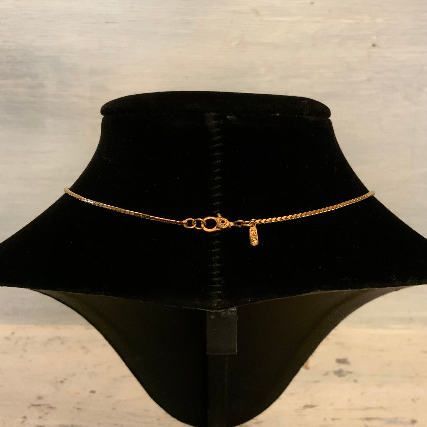 Vintage 80's Monet Gold Tone/Ivory Enamel Modernist Wave Pendant Necklace 16" Good Condition
