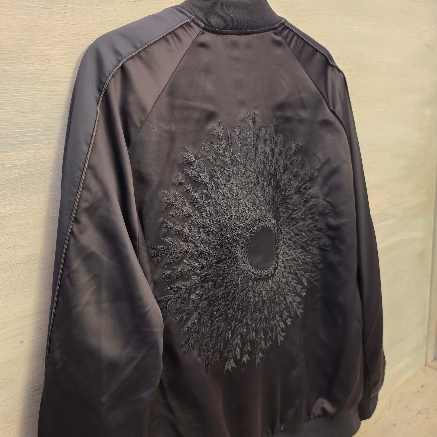 H&M Black Satiny Unisex Embroidered Floral Sunburst Bomber Jacket Size Large Good Condition